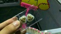 谁能帮我看看这和田龙凤牌金襄玉是真的假的，值多少